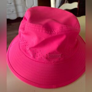 Neon pink Melin caddy collection floating bucket hat